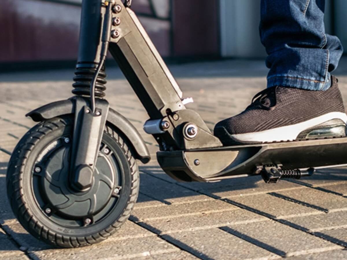 A child riding a scooter